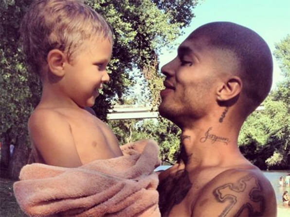 An undated picture of Jeremy Meeks and his child